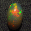 4.35 / Cts - 10x17 mm - Oval Cut Cabochon - WELO ETHIOPIAN OPAL - Amazing Green Red Mix Fire